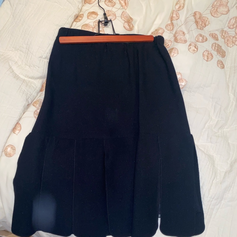 Basically new. Italian designer. MIDI skirt